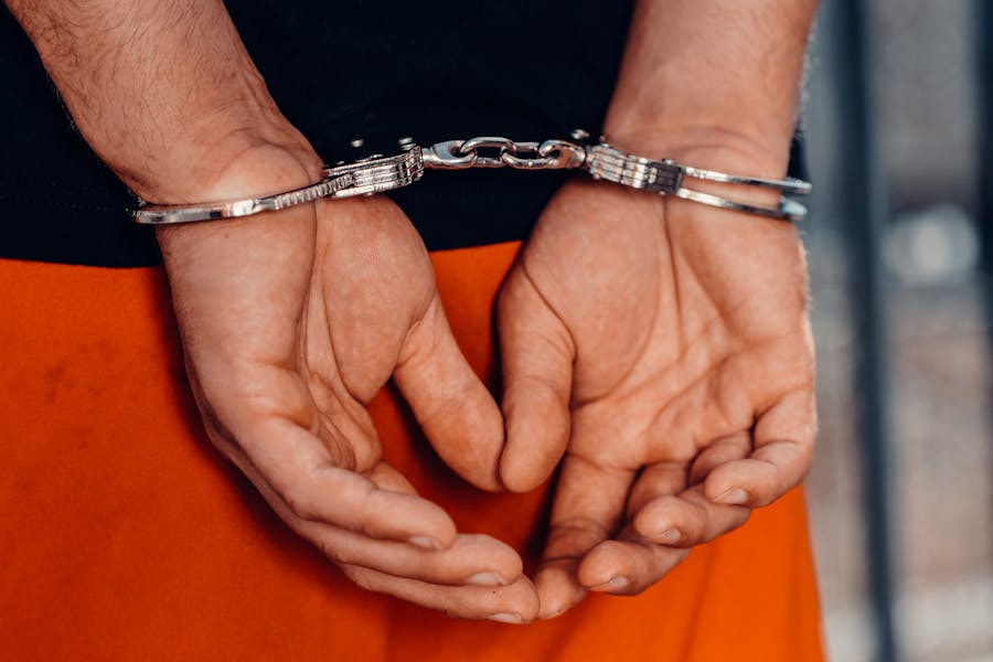 close-up shot of a person with handcuffs